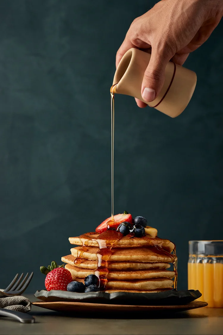 Syrup pour over pancake stack