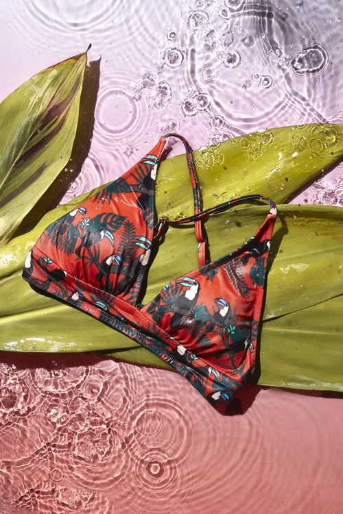 MeUndies swim top on leaves
